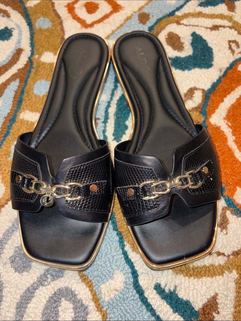 Aldo Black Slide Sandals with Gold Chain Accent